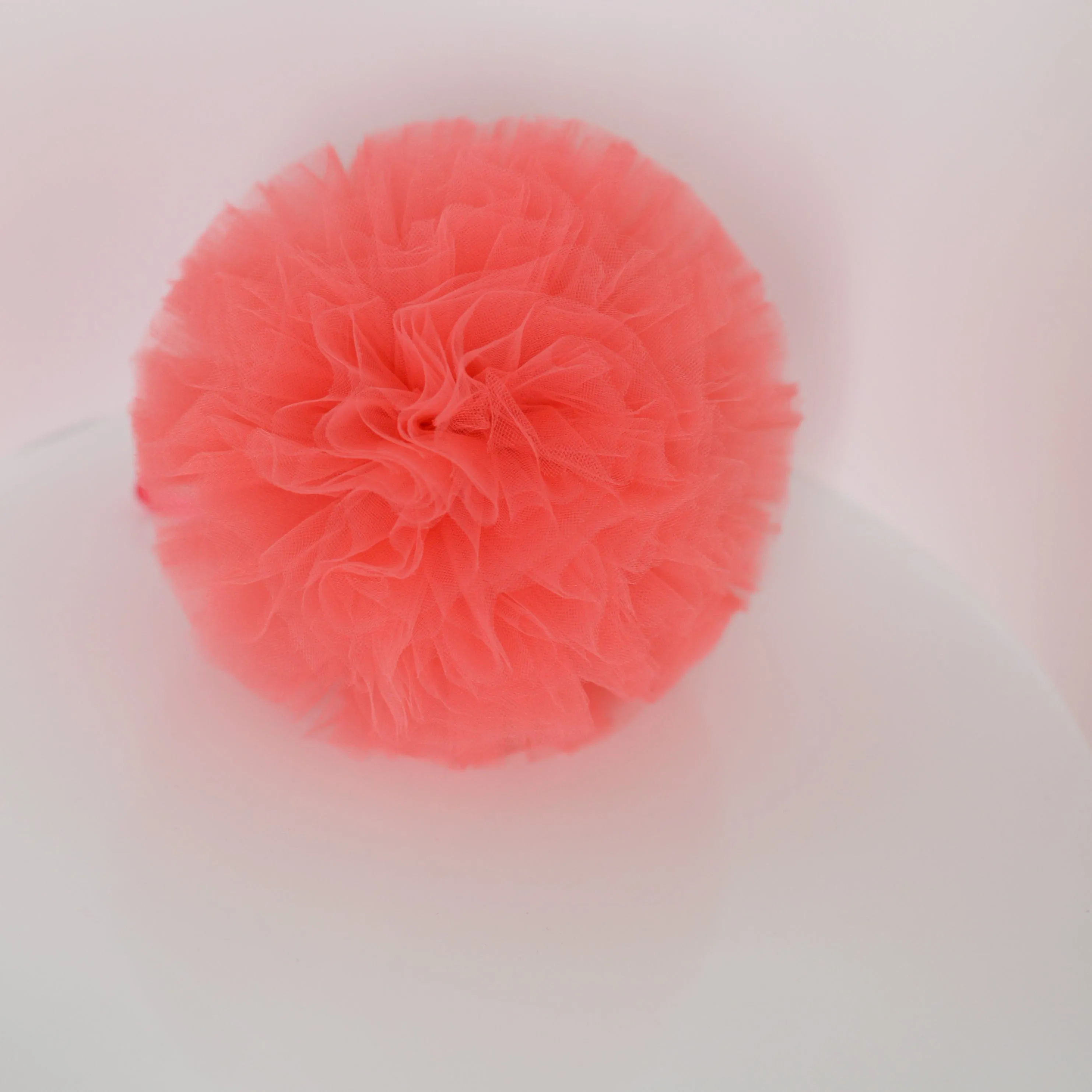 Coral tulle pom pom